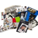 Paul McCartney/Wings, approximately one hundred page scrapbook, a folder of magazine cut outs, first
