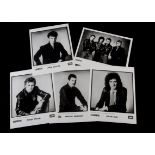 Queen, five promotional photographs individual band members plus a group shot, (26cm X 20cm) good