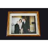 Sir John Mills, a signed colour photograph framed and glazed of him meeting Tony and Cherie Blair