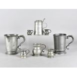 A quantity of pewter tankards, including three quartz, a pint, and others together with various