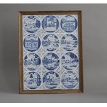 A set of twelve modern framed Delft tiles, months of the year, each depicting scenes of work