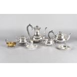 A four piece silver plated tea set, chamber stick, and other items