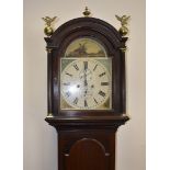 An eight day long case clock, oak case, painted dial, roman numerals, two subsidiary dials, dome