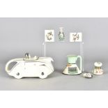 A Sadler racing car OKT42 teapot, in cream and silver, together with a Japanese pottery chamber