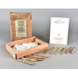 A collection of local plain bobbins, made from cherry wood, olive and others together with a