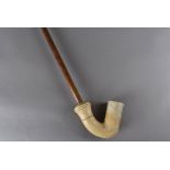 A long fruitwood and meerschaum pipe, with bamboo effect stem 86.5 cm L, together with a