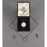 A cased lady's silver open faced fob watch, with white enamel dial and blue roman numerals, an opera