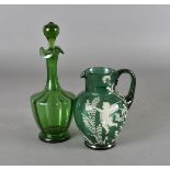 A Victorian Mary Gregory style green glass jug, together with a similar period green glass bottle