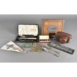 A collection of miscellaneous items, including silver teaspoons, cufflinks, coins, pens, railway