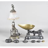 A contemporary bronzed table lamp, with figural mount of young girl holding pussy cat on oval plinth