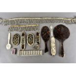 A group of Victorian tortoiseshell and mother of pearl and other items, including a mop teaspoon,