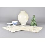 A collection of Chinese items, including a blue and white rice bowl and cover, a green stoneware
