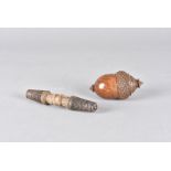 A 19th Century coquilla nut, nutmeg grater carved as an acorn with screw off lid with vegetable