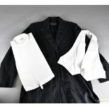 A vintage mourning suit with trousers, two pairs of cricket white trousers and a collection of