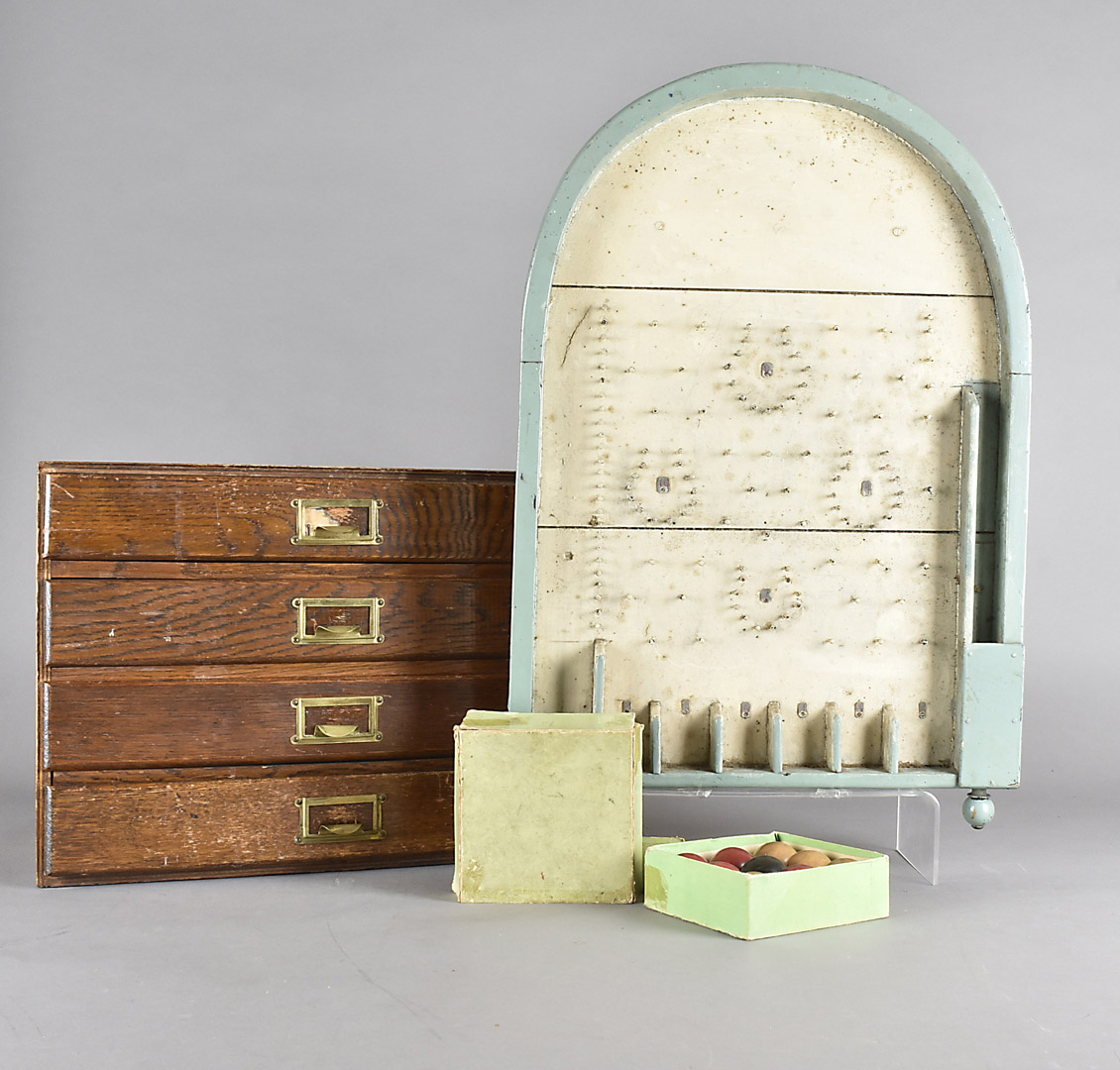 An oak four drawer stationers cabinet, together with a bagatelle board, table billiard board and