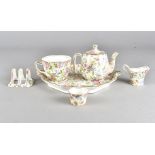 A Royal Winton chintz pattern breakfast tray, the hexagonal plate with teapot, sugar bowl, milk jug,