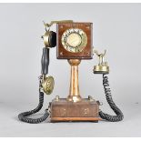 A French Grammont table telephone, Type 10 Systeme Eurieult, having mahogany stem, bakelite plinth