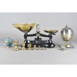 A set of Libra scales, with brass trays and weights together with a silver plated egg shaped egg