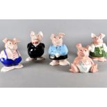 A set of seven Wade Natwest pigs, four boxed