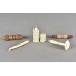 A collection of 19th Century needle cases, including a novelty carved ivory example modelled as a