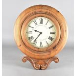 A modern pine wall clock, of circular form with scroll pediment, dial inscribed Another Place