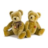 Two large modern Hermann teddy bears: with golden mohair, jointed and red plastic tags -24in. (