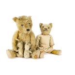 A Chiltern-type teddy bear 1930s, with golden mohair, clear and black glass eyes, black stitched