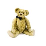 A rare, fine and large Farnell teddy bear 1920s, with bright golden mohair, orange and black glass