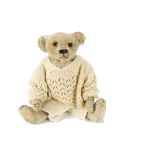 An unusual Farnell white alpaca plush teddy bear 1930s, with replaced orange and black glass eyes,