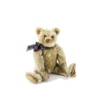 A rare Farnell white mohair teddy bear 1920s, with clear and black glass eyes, pronounced clipped