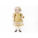 A Simon & Halbig for Kämmer & Reinhardt child doll, with brown sleeping eyes, pierced ears, blonde