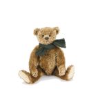 A fine early Steiff teddy bear, with cinnamon/brown mohair, black boot button eyes, pronounced