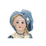 An S.F.B.J. 230 child doll, with fixed blue glass eyes, pierced ears, blonde mohair wig, jointed