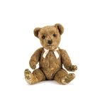 An unusual Chiltern Hugmee teddy bear 1950s, with rare light brown alpaca plush, orange and black