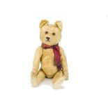 An interesting German 1940s artsilk teddy bear, with brown and black glass eyes, pronounced