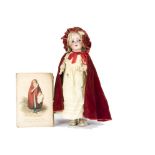 A Simon & Halbig for Kämmer & Reinhardt Little Red Riding Hood child doll, with blue sleeping