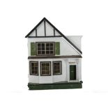 A Tri-ang A-symmetric dolls’ house DH/D 1924, with pebble-dashed exterior, ground floor bay