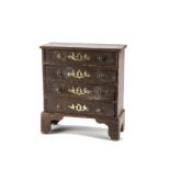 A rare Bubb large scale dolls’ house chest of drawers 1820-30s, with four drawers, brass knobs and
