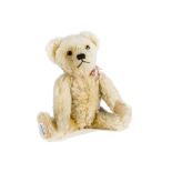A fine 1930s Alpha Farnell teddy bear, with light golden mohair, orange and black glass eyes,