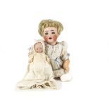 Two German character babies: one marked S¼ with blue sleeping eyes, blonde mohair wig, bent-limbed