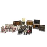 Mid 20th century British dolls’ house furniture: including Pit-A-Pat table, stool, chest of