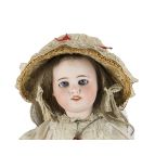 A S.F.B.J. 60 child doll, with blue sleeping eyes, blonde hair wig, jointed papier-mâché body, white