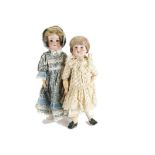Two bisque head German child dolls: one Armand Marseille 390 with brown sleeping eyes -16¼in. (41.