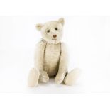 ‘Beau’, a rare early large Steiff white mohair teddy bear, with black boot button eyes, pronounced