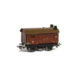 A Rare Märklin H0 Gauge 3-rail War-time Production ref 381SK Lighted Goods Van, in brown, with