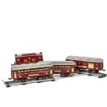 A Lionel Standard Gauge 3-rail No 8 Electric Locomotive Coaches and Track, the locomotive in red