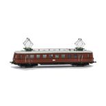 A Fleischmann H0 Gauge 2-rail Bogie Electric Railcar, unboxed, in DB brown with black lining, VG.