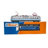 Roco H0 Gauge 3-rail Swiss Electric Locomotive and German Railcar, comprising ref 43951, a SBB/CFF