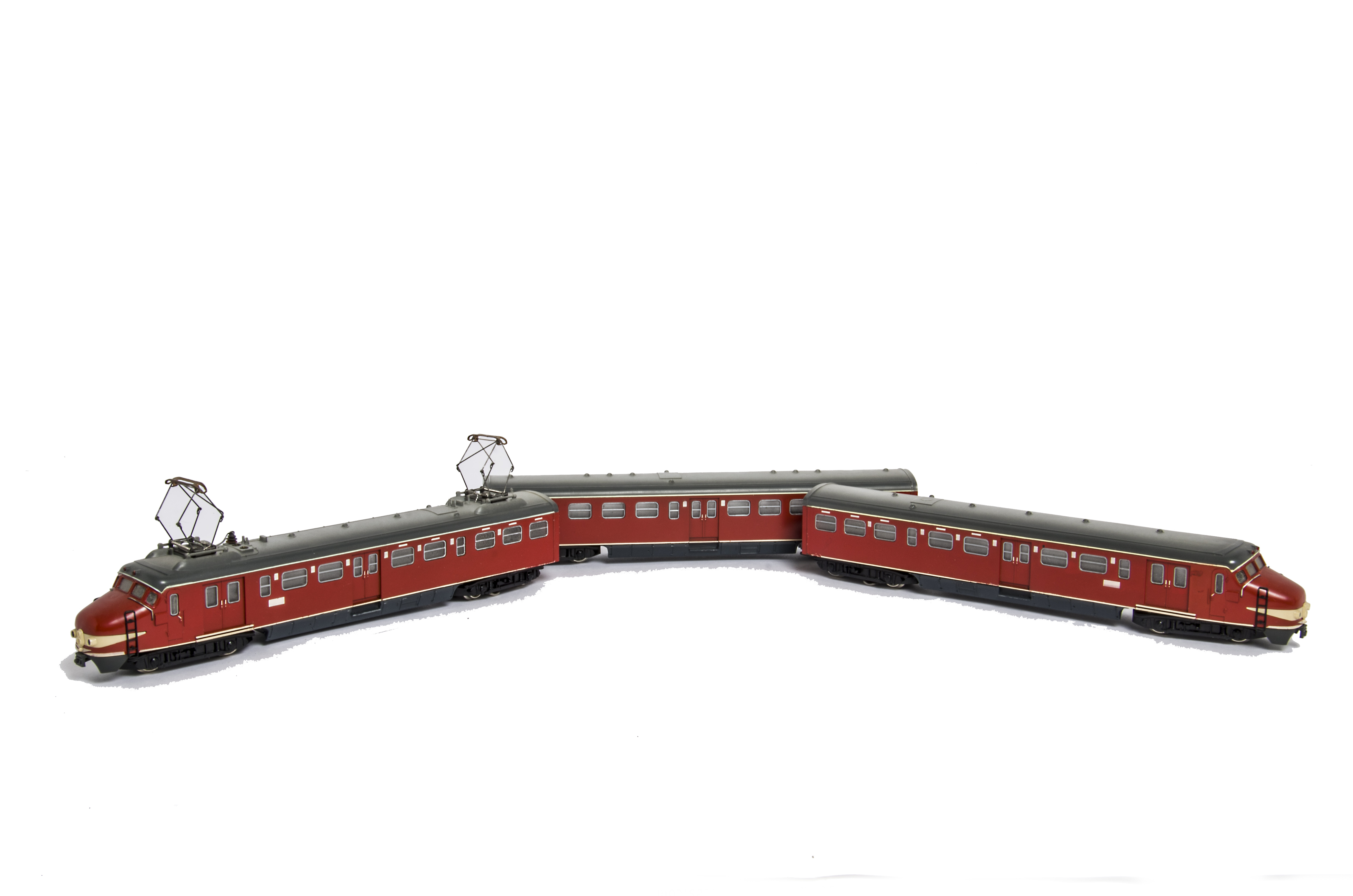 A Trix Express 00 Gauge 2/3-rail 12v DC Dutch-style 3-car Electric Train, ref 2301 in red livery