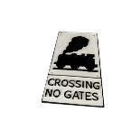 A reproduction cast iron Railway Sign Crossing No Gates, depicting Steam Engine, painted in white
